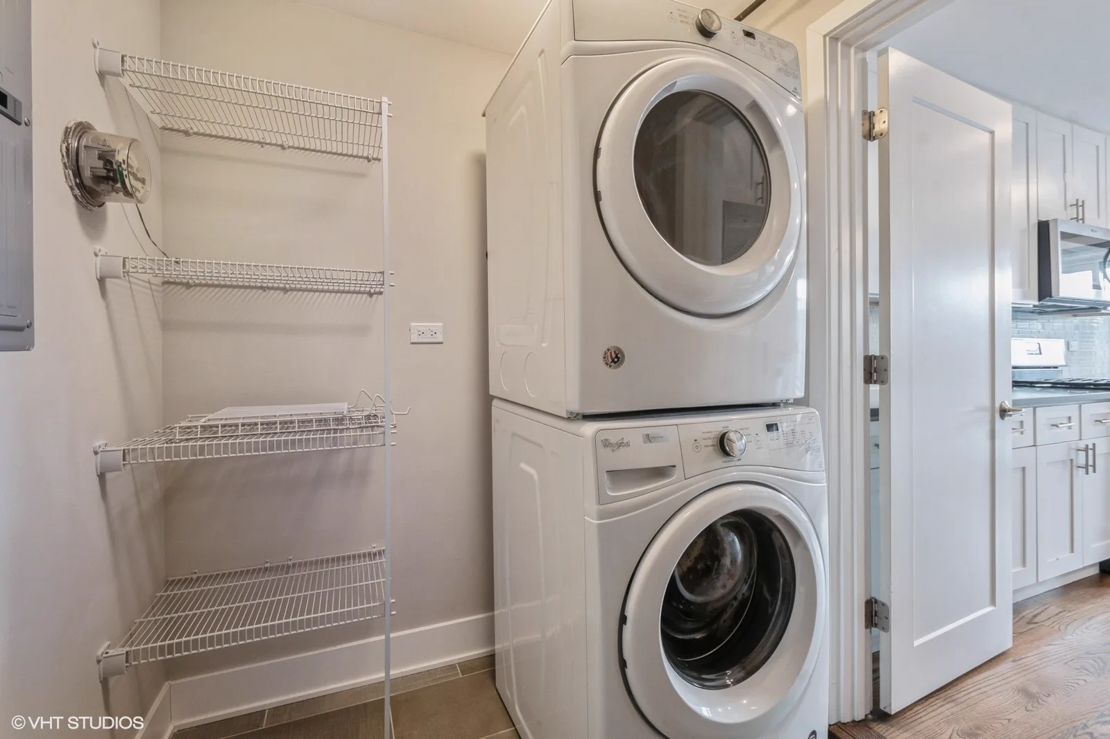 In-unit stacked washer and dryer